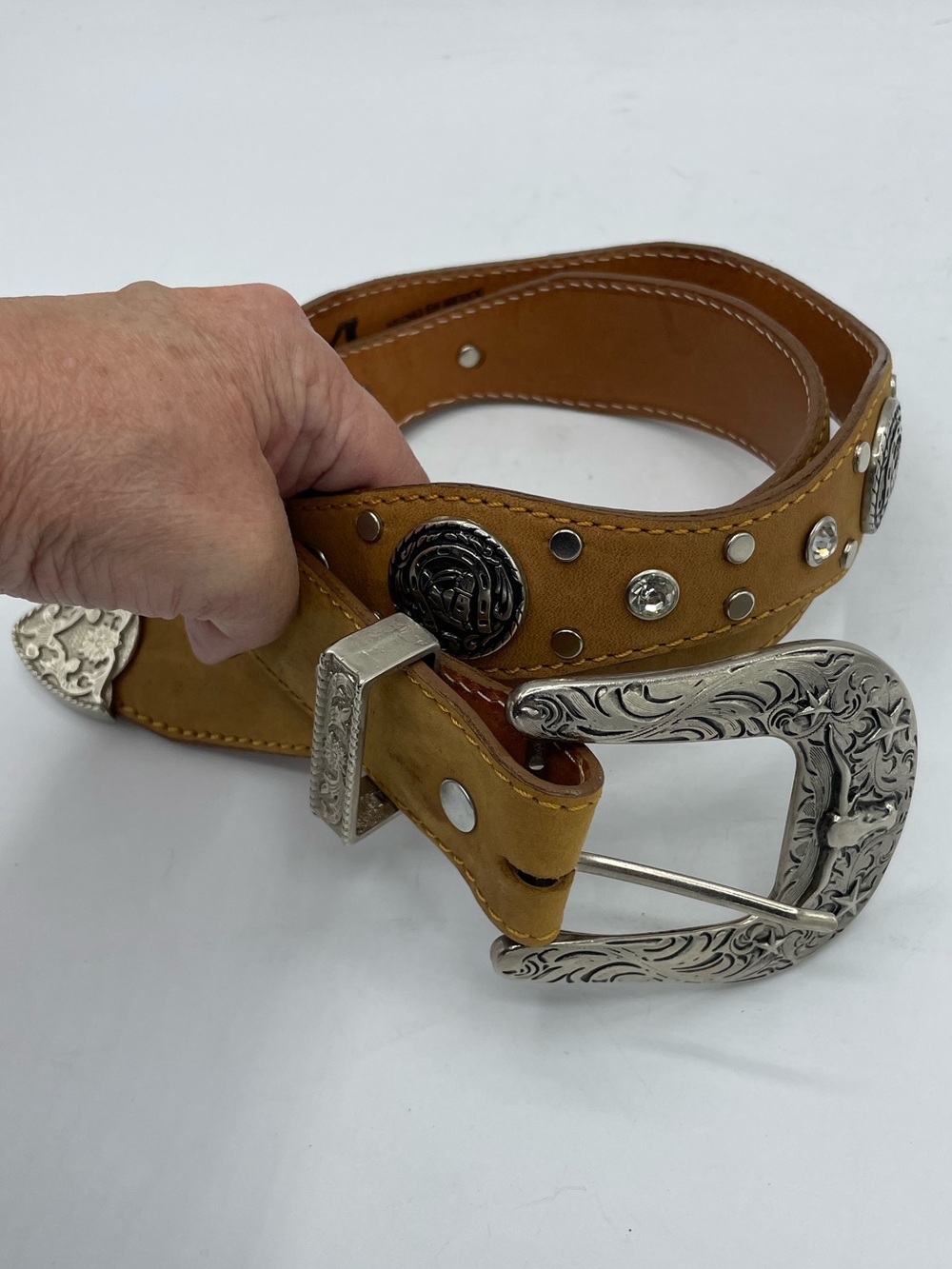 Tan Leather Belt with Ornate Silver Western Buckle. Rhinestone and Stud Detail.